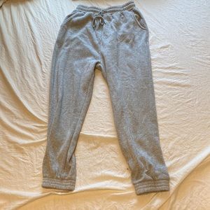 Small womens grey sweatpants.small rip on the inside of the leg but can be fixed